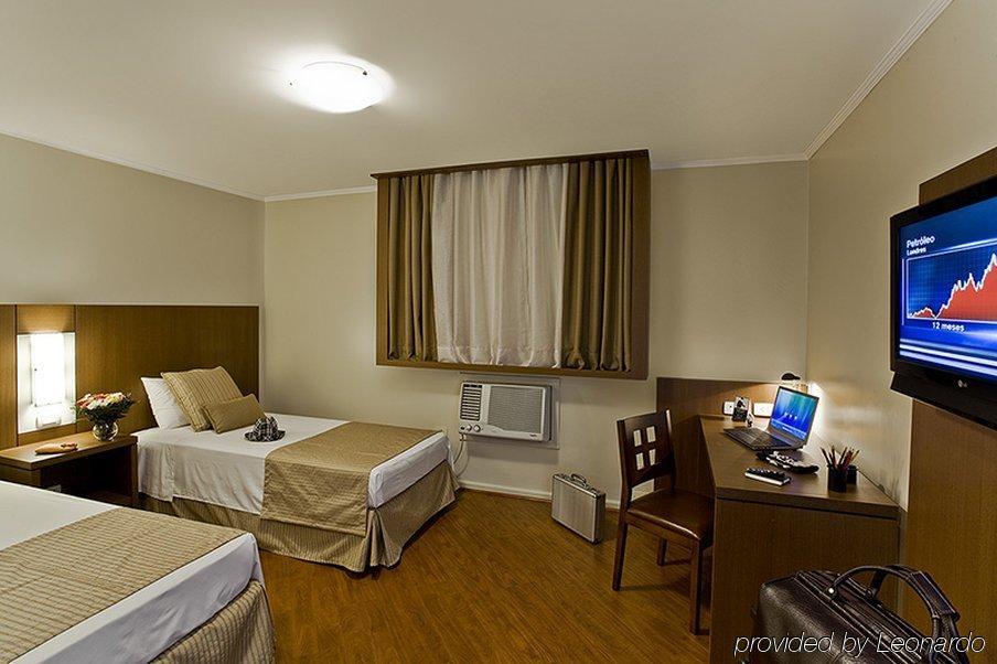 Hotel Deville Куритиба Стая снимка