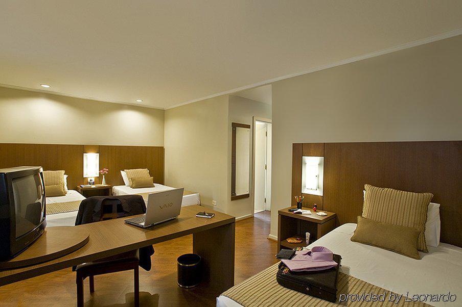 Hotel Deville Куритиба Стая снимка